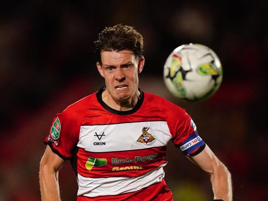 Doncaster turn form book upside down to beat MK Dons after blistering start