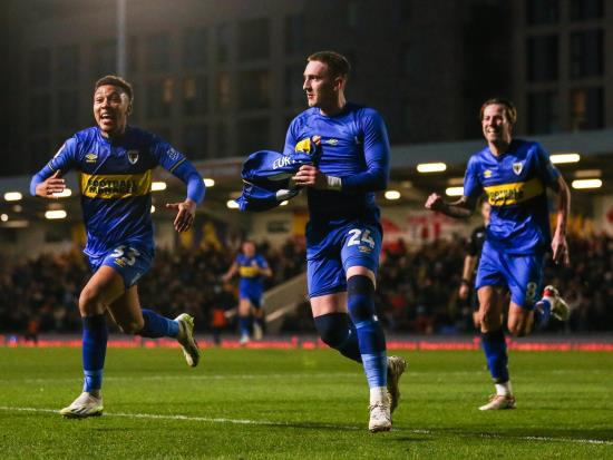 AFC Wimbledon leave it late as Ronan Curtis ends 10-man Mansfield’s resistance