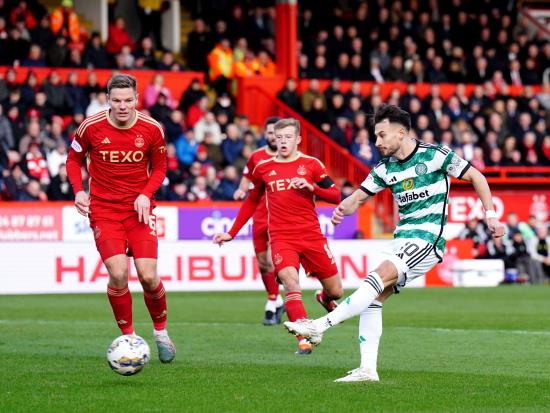 New signing Kuhn rescues point for Celtic as fans protest at transfer business