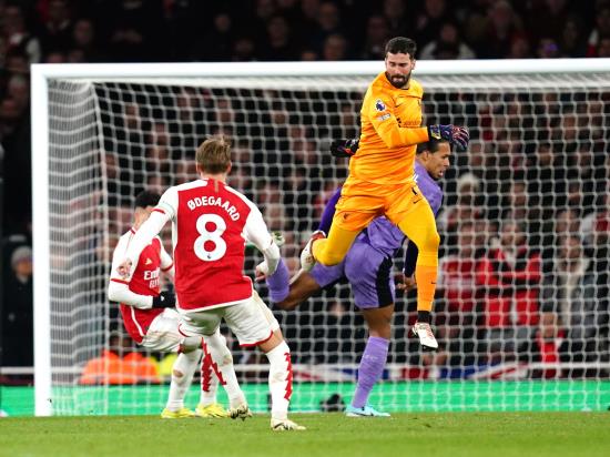 Arsenal capitalise on Alisson Becker errors to cut Liverpool lead to two points