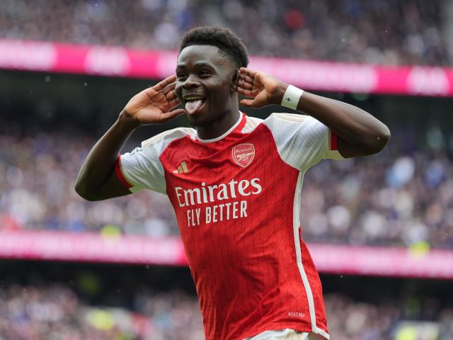 Arsenal withstand Tottenham’s second-half fightback to boost title hopes