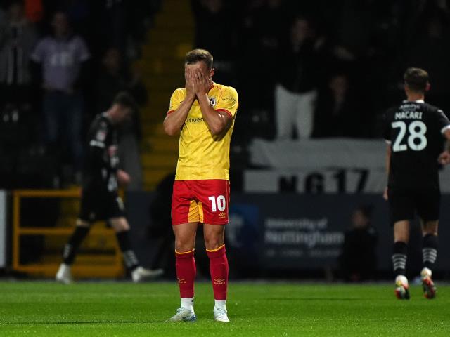 Grimsby slip out of League Two play-off places after goalless draw at MK Dons