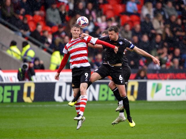 Doncaster crowned League Two champions as Rob Street brace downs Notts County