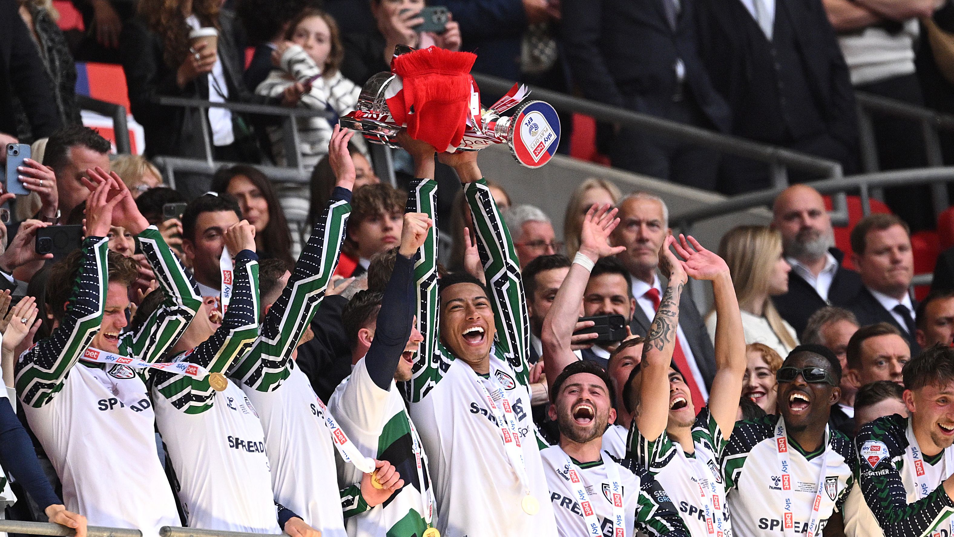 'Not a bad day' - Jordan Henderson puts aside Ajax misery to celebrate with Jobe Bellingham as Sunderland promoted back to Premier League after dramatic Championship play-off win