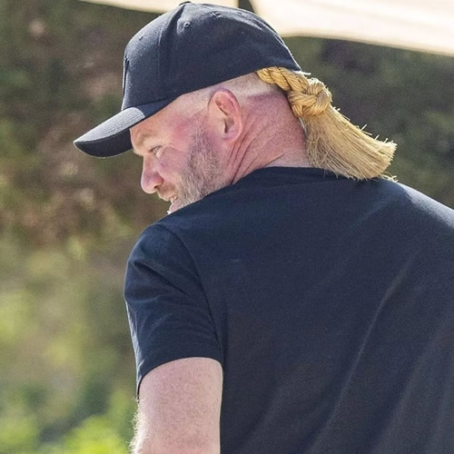 Wayne Rooney gets Erling Haaland ponytail in shock new look on hol with bikini-clad Coleen