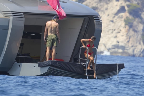 HAALIDAY MODE Erling Haaland finally enjoys delayed holiday as Man City star dives off yacht with glamorous bikini-clad girlfriend