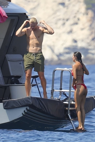 HAALIDAY MODE Erling Haaland finally enjoys delayed holiday as Man City star dives off yacht with glamorous bikini-clad girlfriend