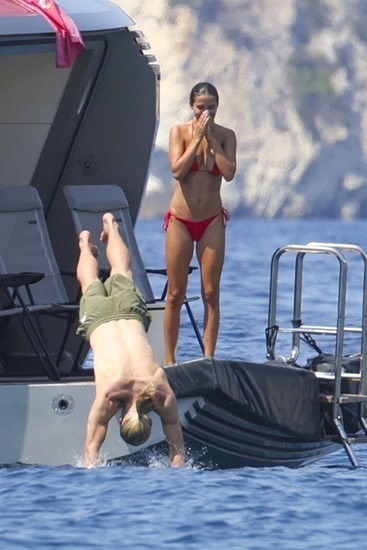 HAALIDAY MODE Erling Haaland finally enjoys delayed holiday as Man City star dives off yacht with glamorous bikini-clad girlfriend