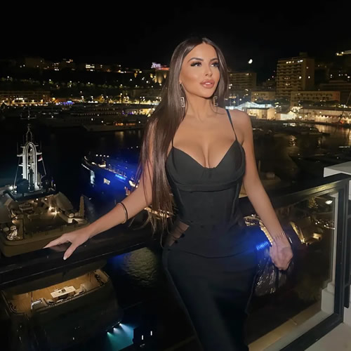 'What a beauty' Kim Kardashian lookalike and football presenter sends fans wild in low-cut top as she watches Chelsea beat Leverkusen