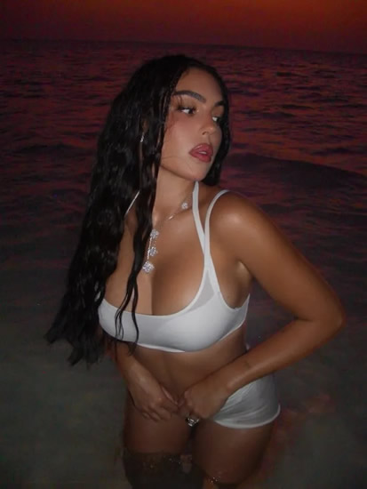 GEORG-EOUS Georgina Rodriguez dubbed ‘perfection’ as she stuns in barely-there see-through outfit for steamy seaside photoshoot