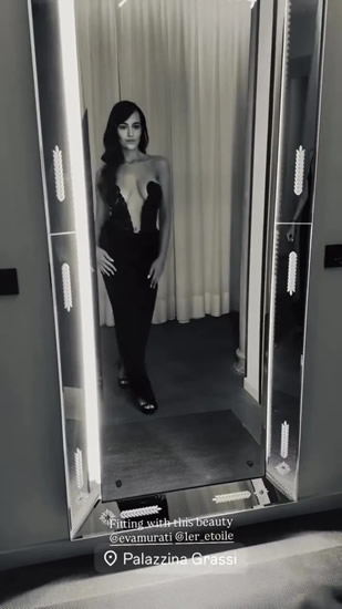 MUR LIKE IT Albanian Laura Woods looks sensational as she goes braless in very daring open black dress