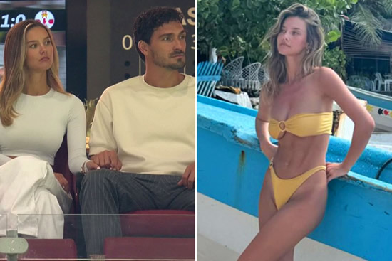 Cameras repeatedly pan to Hummels and model Wag at centre of row with his ex-wife during Germany vs Northern Ireland