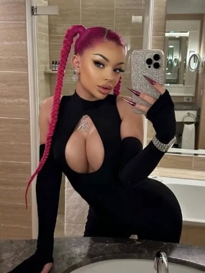 HIP-HOP TO IT Harry Kane poses with raunchy rapper famous for shock TV clip and sliding into footballers’ DMs after Bayern Munich win