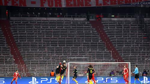 Harry Kane misses first penalty in nine attempts but still scores brace as 10-man Bayern Munich beat Union Saint-Gilloise to qualify for Champions League knockout stages