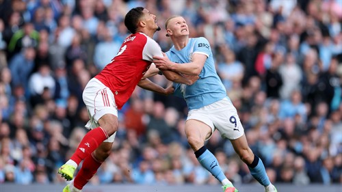 ‘Five points’ - Rooney backs Arsenal for comfortable title win