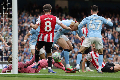 Manchester City 3-0 Brentford: Haaland scores as Man City keep title hopes alive with win over Brentford