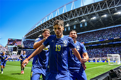 Bosnia edge closer to last 32 as Qatar crash out of World Cup