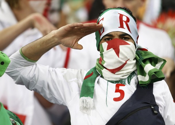 Fans dressed and cheer