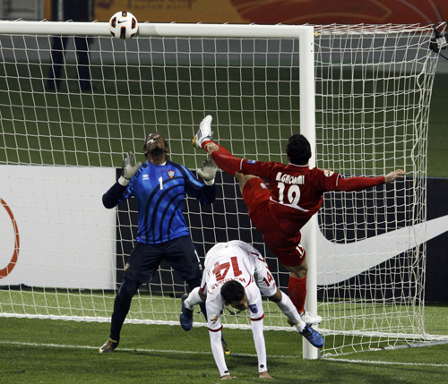 Iraq follows Iran into Asian Cup quarterfinals