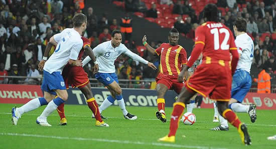 Andy Carroll strikes for England but Capello says it's up to Dalglish to buy him a pint