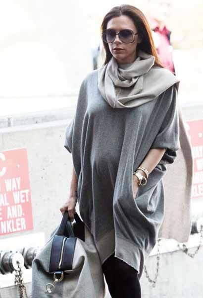 Victoria Beckham shows off her growing baby bump for the first time