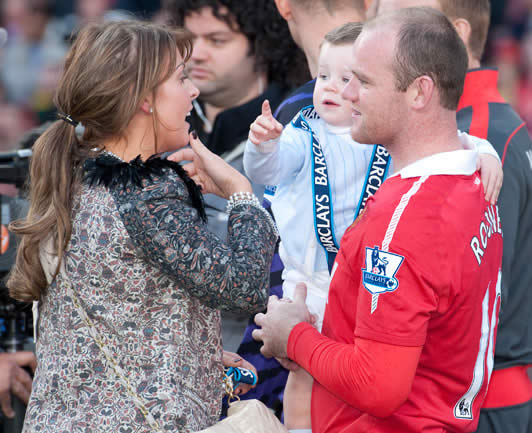 Dapper Kai Rooney travels in style