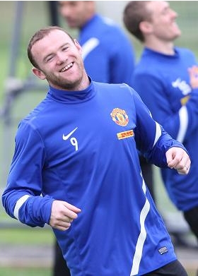 Wayne Rooney laughs off his Euro 2012 ban - England striker all smiles in Manchester United training session