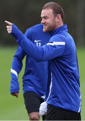 Wayne Rooney laughs off his Euro 2012 ban - England striker all smiles in Manchester United training session