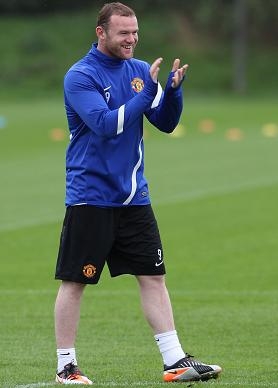 Wayne Rooney laughs off his Euro 2012 ban - England striker all smiles in Manchester United training session