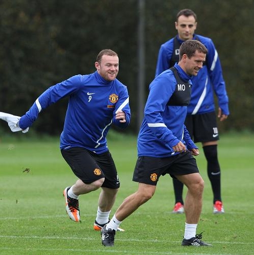 Wayne Rooney laughs off his Euro 2012 ban - England striker all smiles in Manchester United training session