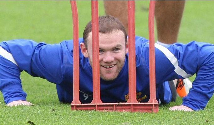 Wayne Rooney laughs off his Euro 2012 ban - England striker all smiles in Manchester United training session