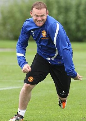 Wayne Rooney laughs off his Euro 2012 ban - England striker all smiles in Manchester United training session