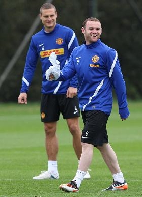 Wayne Rooney laughs off his Euro 2012 ban - England striker all smiles in Manchester United training session
