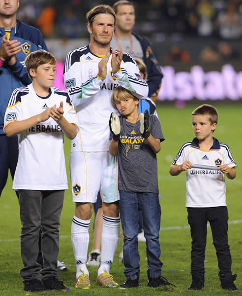 David Beckham and boys bid fond farewell to fans