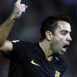 Xavi lifts listless Barca to win at Granada