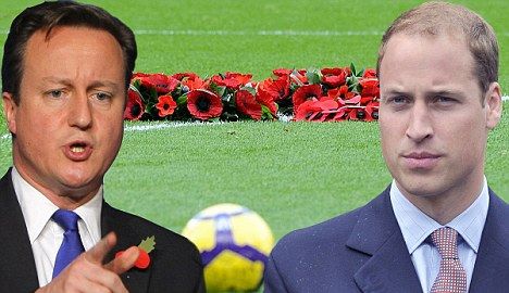 Players WILL honour war heroes as FIFA cave in... but why still no poppy on the shirt?