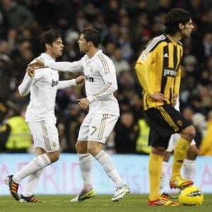Real go seven clear as Barca draw