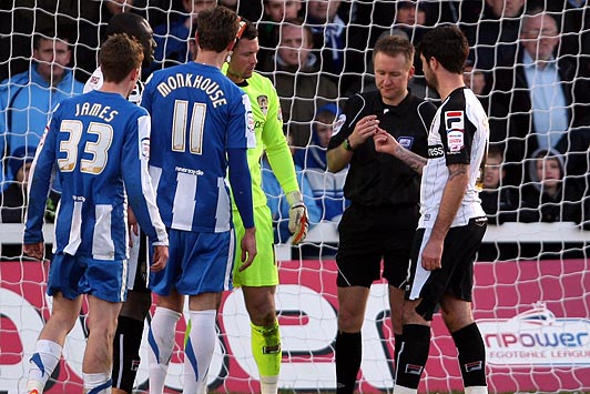 Shot hits the fan - Cop probe as goalie lashes ball into crowd