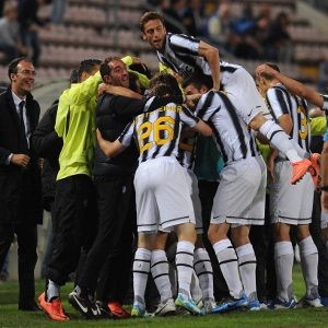 Juventus win title as Milan lose derby
