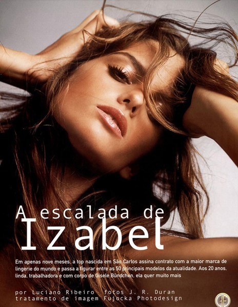 Boxing champion Anderson Silva takes photos with Izabel Goulart for a Brazil fashion magazine