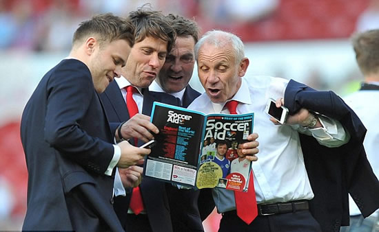 It's meant to be a friendly game! Gordon Ramsay is stretchered off after blistering tackle from Teddy Sheringham at Soccer Aid