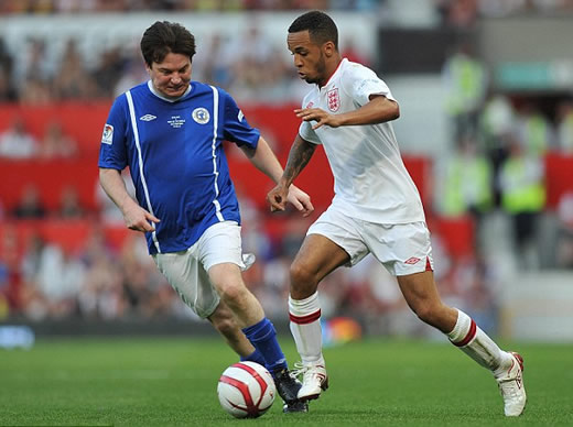 It's meant to be a friendly game! Gordon Ramsay is stretchered off after blistering tackle from Teddy Sheringham at Soccer Aid