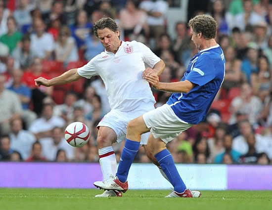 It's meant to be a friendly game! Gordon Ramsay is stretchered off after blistering tackle from Teddy Sheringham at Soccer Aid