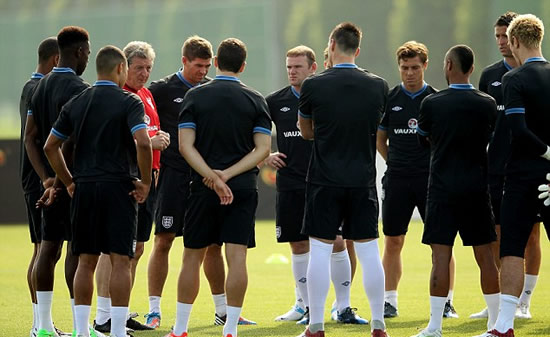 Come in No 9... Carroll in pole position to start after Hodgson hands him key shirt