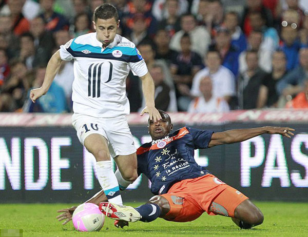 I can't wait to get started! Hazard seals £32m Chelsea switch... and takes dig at rivals United