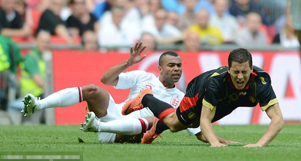 I can't wait to get started! Hazard seals £32m Chelsea switch... and takes dig at rivals United