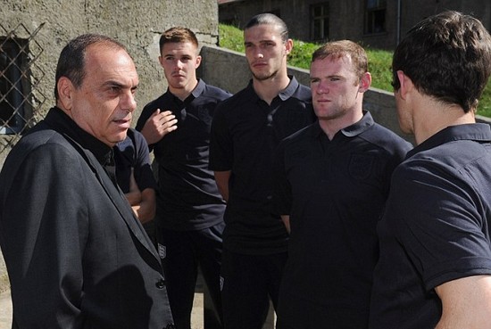 Day football came second: Rooney heads England delegation on emotional tour of harrowing Nazi concentration camp at Auschwitz