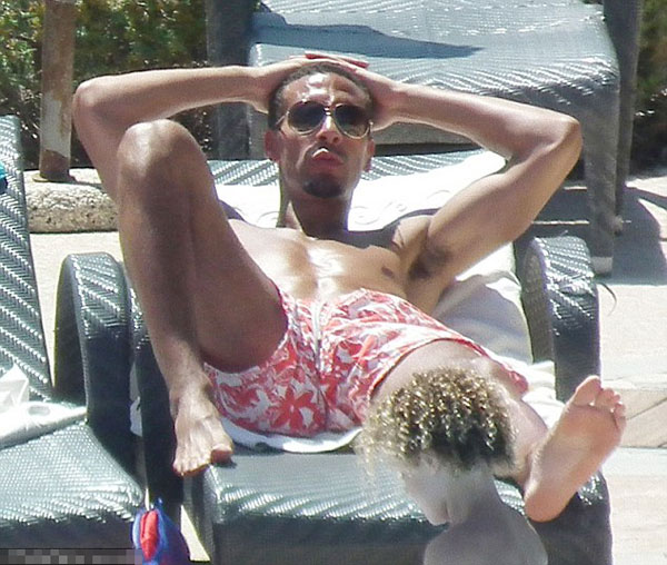 While the team will play... Rio is away: Ferdinand soaks up the sun in Cyprus as England head to the Euros without him