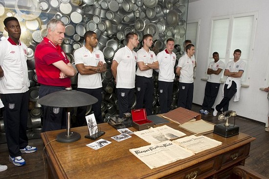 Day football came second: Rooney heads England delegation on emotional tour of harrowing Nazi concentration camp at Auschwitz