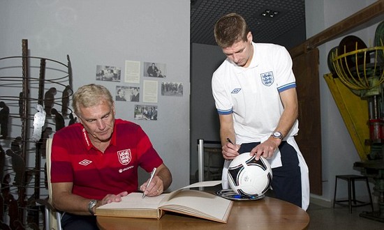 Day football came second: Rooney heads England delegation on emotional tour of harrowing Nazi concentration camp at Auschwitz